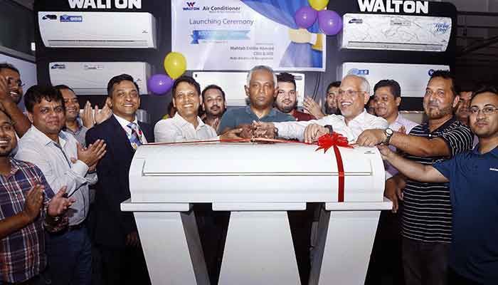 ওয়ালটনের ক্রিস্টালাইন সিরিজের নতুন এসি উন্মুক্ত করছেন রবির এমডি এবং সিইও মাহতাব উদ্দীন আহমেদ, ওয়ালটন হাই-টেক ইন্ডাস্ট্রিজ লিমিটেডের ভাইস-চেয়ারম্যান এস এম শামসুল আলম এবং পরিচালক এস এম মাহবুবুল আলমসহ অন্যরা ওয়ালটনের ক্রিস্টালাইন সিরিজের নতুন এসি উন্মুক্ত করছেন রবির এমডি এবং সিইও মাহতাব উদ্দীন আহমেদ, ওয়ালটন হাই-টেক ইন্ডাস্ট্রিজ লিমিটেডের ভাইস-চেয়ারম্যান এস এম শামসুল আলম এবং পরিচালক এস এম মাহবুবুল আলমসহ অন্যরা