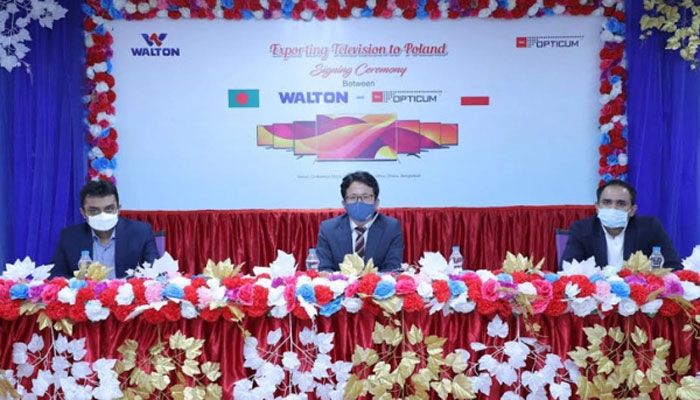 পোল্যান্ডে টেলিভিশন রপ্তানির জন্য ‘অপটিকাম’ এর সঙ্গে চুক্তি স্বাক্ষর অনুষ্ঠানে ওয়ালটনের কর্মকর্তারা পোল্যান্ডে টেলিভিশন রপ্তানির জন্য ‘অপটিকাম’ এর সঙ্গে চুক্তি স্বাক্ষর অনুষ্ঠানে ওয়ালটনের কর্মকর্তারা